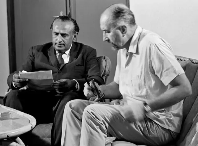 Ghulam Abbas and George Janecek at work in Hollandia, 22 October 1962.